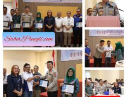 Kapolres Simalungun Terima Piagam Penghargaan di Acara Workshop dan Perayaan HUT ke-6 SMSI