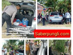Kapolsek Perdagangan Bantu Unit Lantas Polsek Perdagangan Mengevakuasi Korban Laka Lantas Di Nagori Bandar Tongah